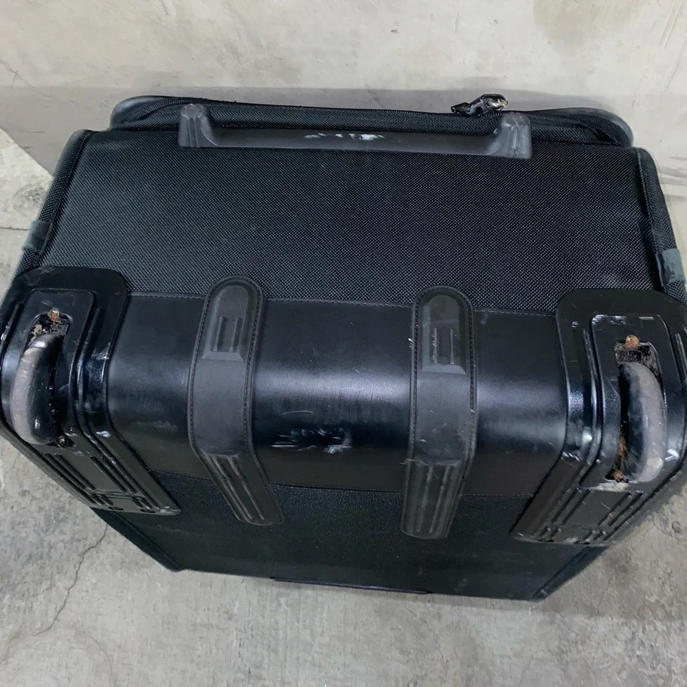 TUMI Check On Suitcase